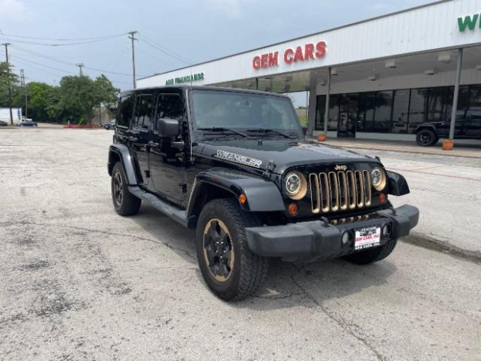 2014 Black Clearcoat Jeep Wrangler Unlimited Sahara 4WD (1C4BJWEG9EL) with an 3.6L V6 DOHC 24V FFV engine, located at 12182 Garland Rd, Dallas, TX, 75218, (214) 521-2040, 0.000000, 0.000000 - Photo #0