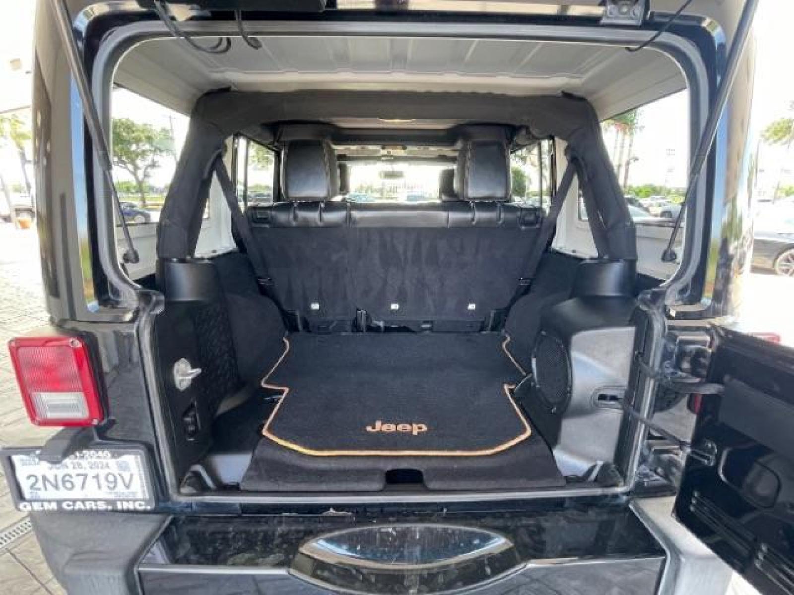 2014 Black Clearcoat Jeep Wrangler Unlimited Sahara 4WD (1C4BJWEG9EL) with an 3.6L V6 DOHC 24V FFV engine, located at 12182 Garland Rd, Dallas, TX, 75218, (214) 521-2040, 0.000000, 0.000000 - Photo #15