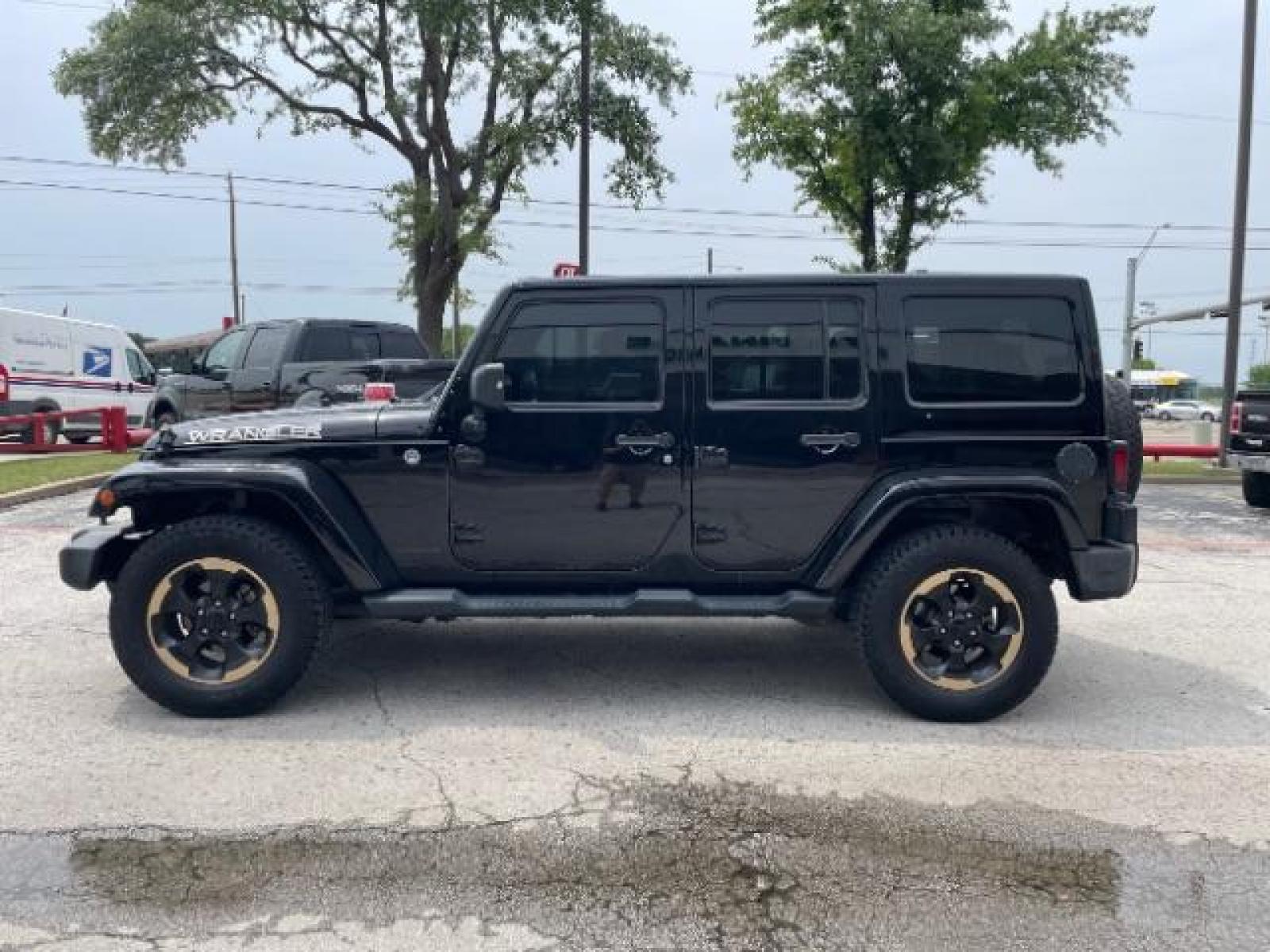 2014 Black Clearcoat Jeep Wrangler Unlimited Sahara 4WD (1C4BJWEG9EL) with an 3.6L V6 DOHC 24V FFV engine, located at 12182 Garland Rd, Dallas, TX, 75218, (214) 521-2040, 0.000000, 0.000000 - Photo #1