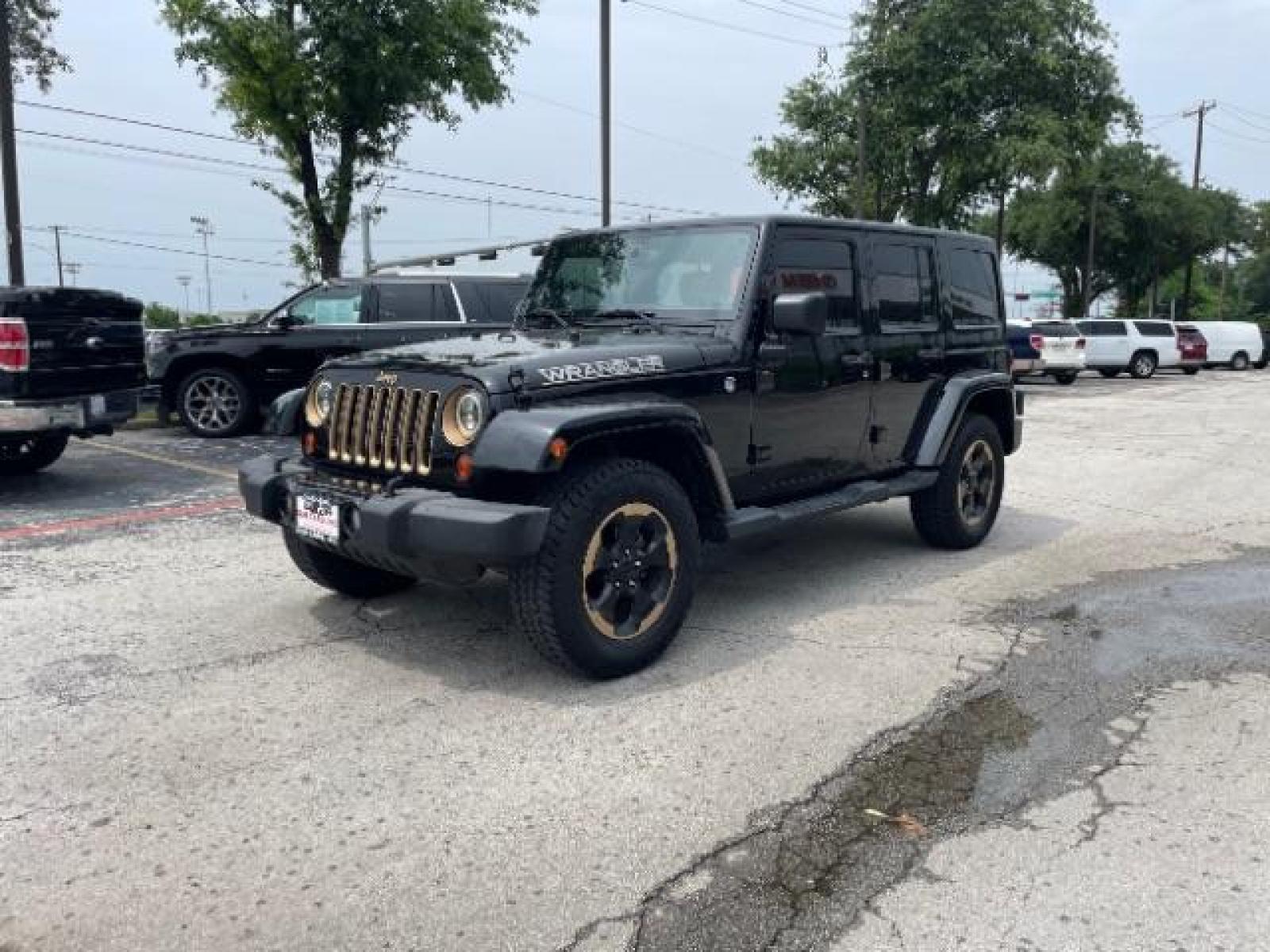 2014 Black Clearcoat Jeep Wrangler Unlimited Sahara 4WD (1C4BJWEG9EL) with an 3.6L V6 DOHC 24V FFV engine, located at 12182 Garland Rd, Dallas, TX, 75218, (214) 521-2040, 0.000000, 0.000000 - Photo #2