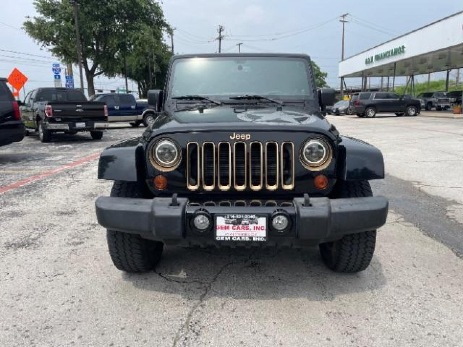 2014 Black Clearcoat Jeep Wrangler Unlimited Sahara 4WD (1C4BJWEG9EL) with an 3.6L V6 DOHC 24V FFV engine, located at 12182 Garland Rd, Dallas, TX, 75218, (214) 521-2040, 0.000000, 0.000000 - Photo #3