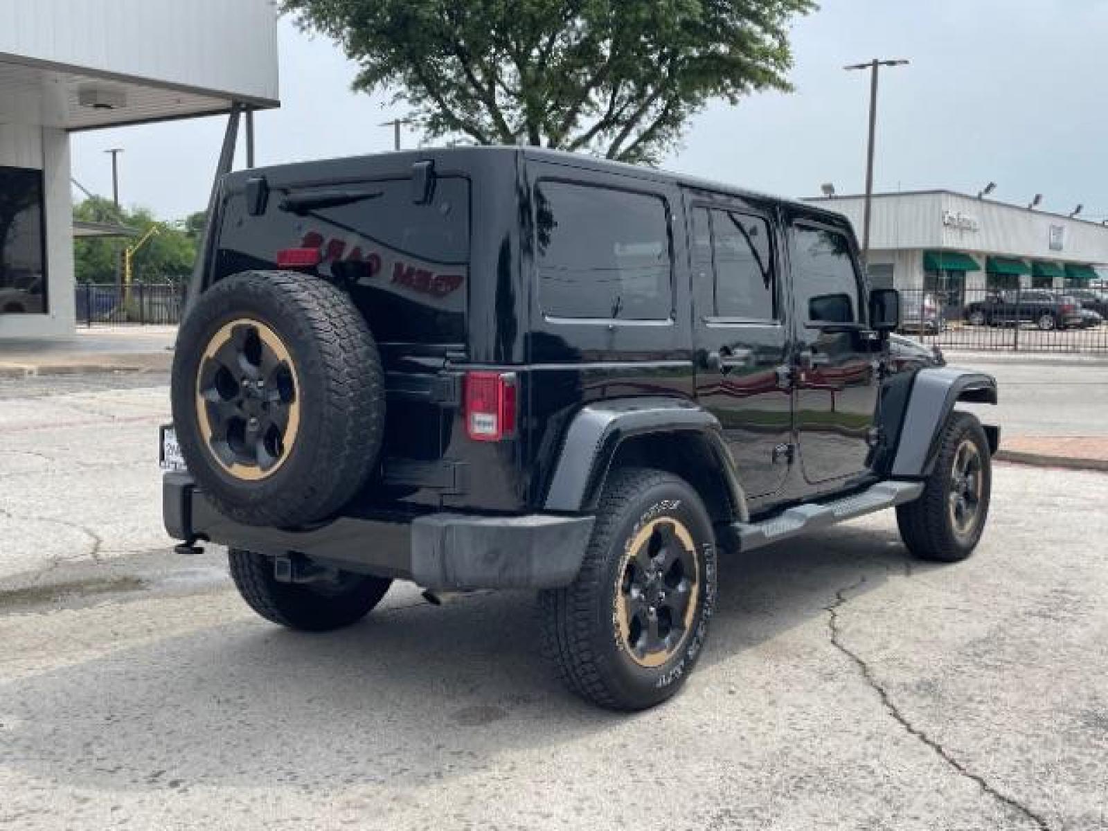 2014 Black Clearcoat Jeep Wrangler Unlimited Sahara 4WD (1C4BJWEG9EL) with an 3.6L V6 DOHC 24V FFV engine, located at 12182 Garland Rd, Dallas, TX, 75218, (214) 521-2040, 0.000000, 0.000000 - Photo #7