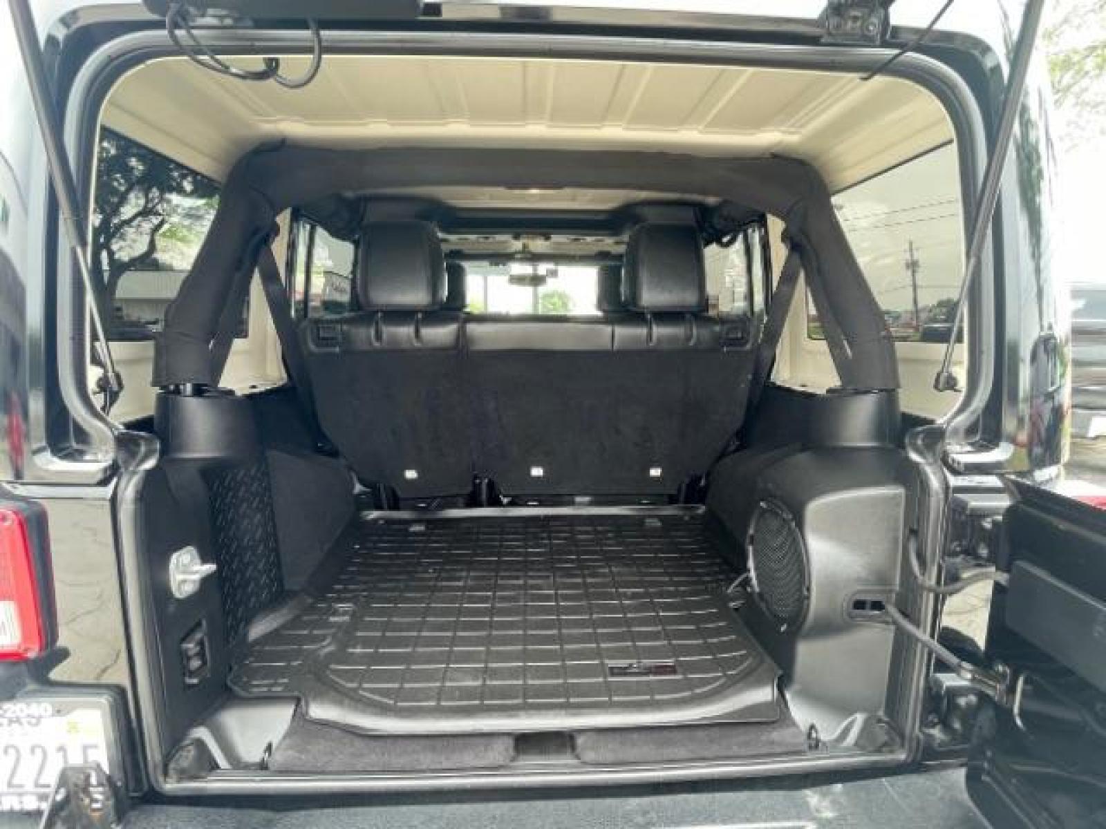 2014 Black /Dark Saddle/Black Jeep Wrangler Unlimited Sahara 4WD (1C4HJWEG3EL) with an 3.6L V6 DOHC 24V FFV engine, located at 12182 Garland Rd, Dallas, TX, 75218, (214) 521-2040, 0.000000, 0.000000 - Photo #16