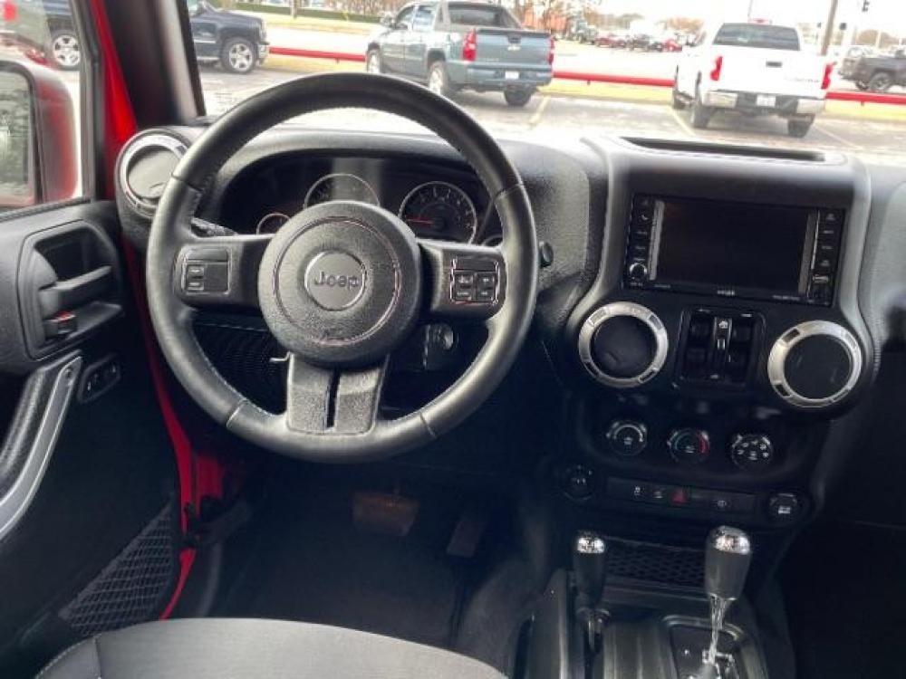 2018 Red Jeep Wrangler JK Unlimited Sahara 4WD (1C4BJWEG0JL) with an 3.6L V6 DOHC 24V FFV engine, 6-Speed Automatic transmission, located at 12182 Garland Rd, Dallas, TX, 75218, (214) 521-2040, 0.000000, 0.000000 - Photo #12