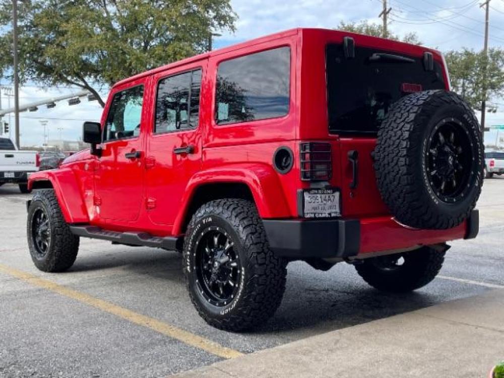 2018 Red Jeep Wrangler JK Unlimited Sahara 4WD (1C4BJWEG0JL) with an 3.6L V6 DOHC 24V FFV engine, 6-Speed Automatic transmission, located at 12182 Garland Rd, Dallas, TX, 75218, (214) 521-2040, 0.000000, 0.000000 - Photo #4