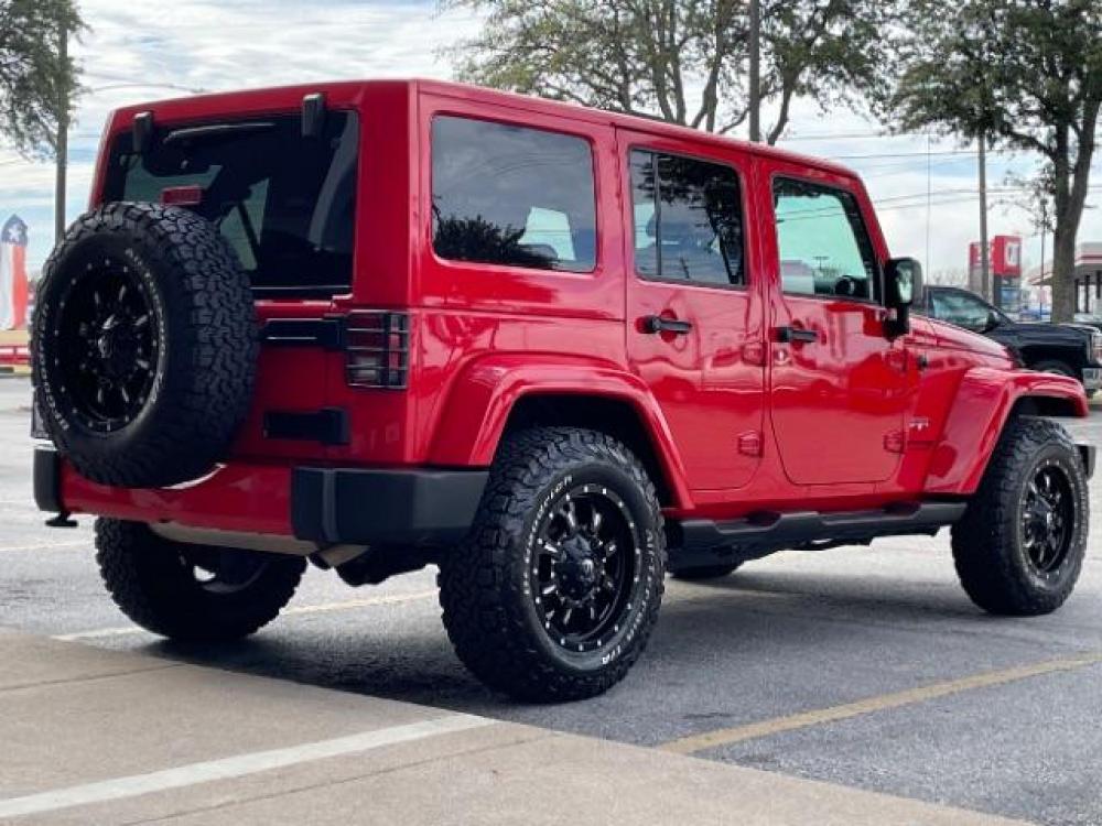 2018 Red Jeep Wrangler JK Unlimited Sahara 4WD (1C4BJWEG0JL) with an 3.6L V6 DOHC 24V FFV engine, 6-Speed Automatic transmission, located at 12182 Garland Rd, Dallas, TX, 75218, (214) 521-2040, 0.000000, 0.000000 - Photo #6