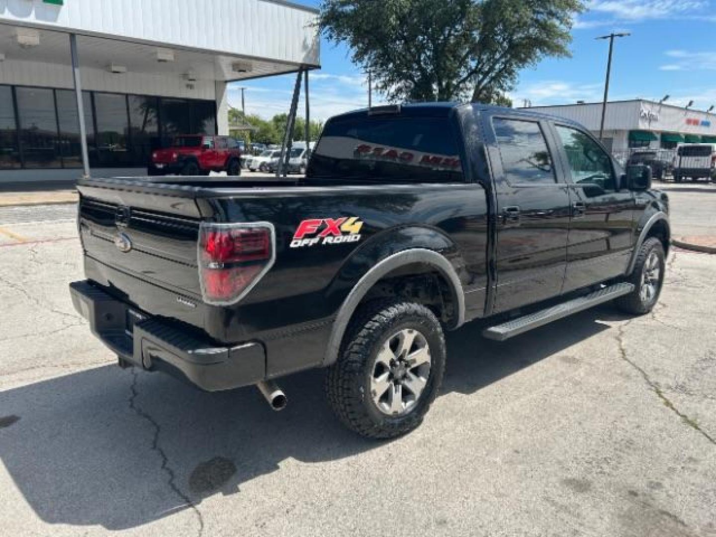 2013 BLACK Ford F-150 FX4 SuperCrew 5.5-ft (1FTFW1EF1DK) with an 5.0L V8 engine, 6-Speed Automatic transmission, located at 12182 Garland Rd, Dallas, TX, 75218, (214) 521-2040, 0.000000, 0.000000 - Photo#6