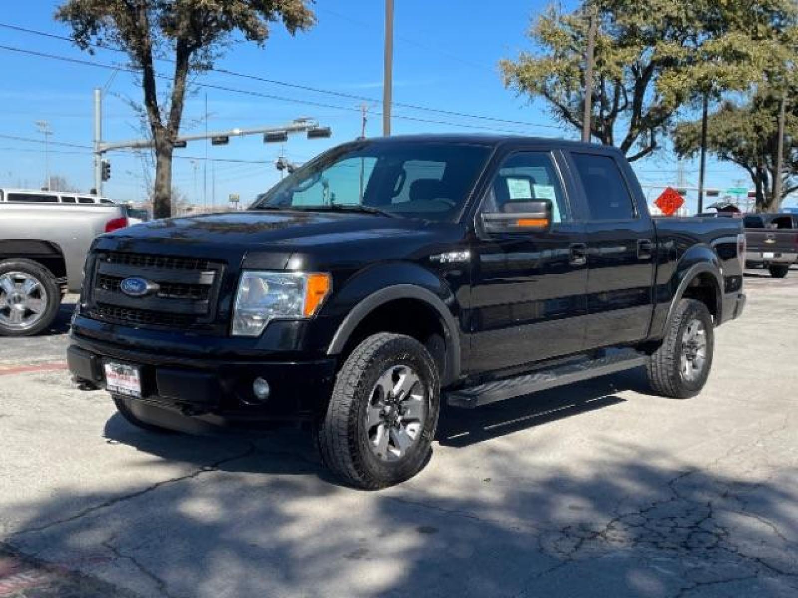 2013 BLACK Ford F-150 FX4 SuperCrew 5.5-ft (1FTFW1EF1DK) with an 5.0L V8 engine, 6-Speed Automatic transmission, located at 12182 Garland Rd, Dallas, TX, 75218, (214) 521-2040, 0.000000, 0.000000 - Photo #1