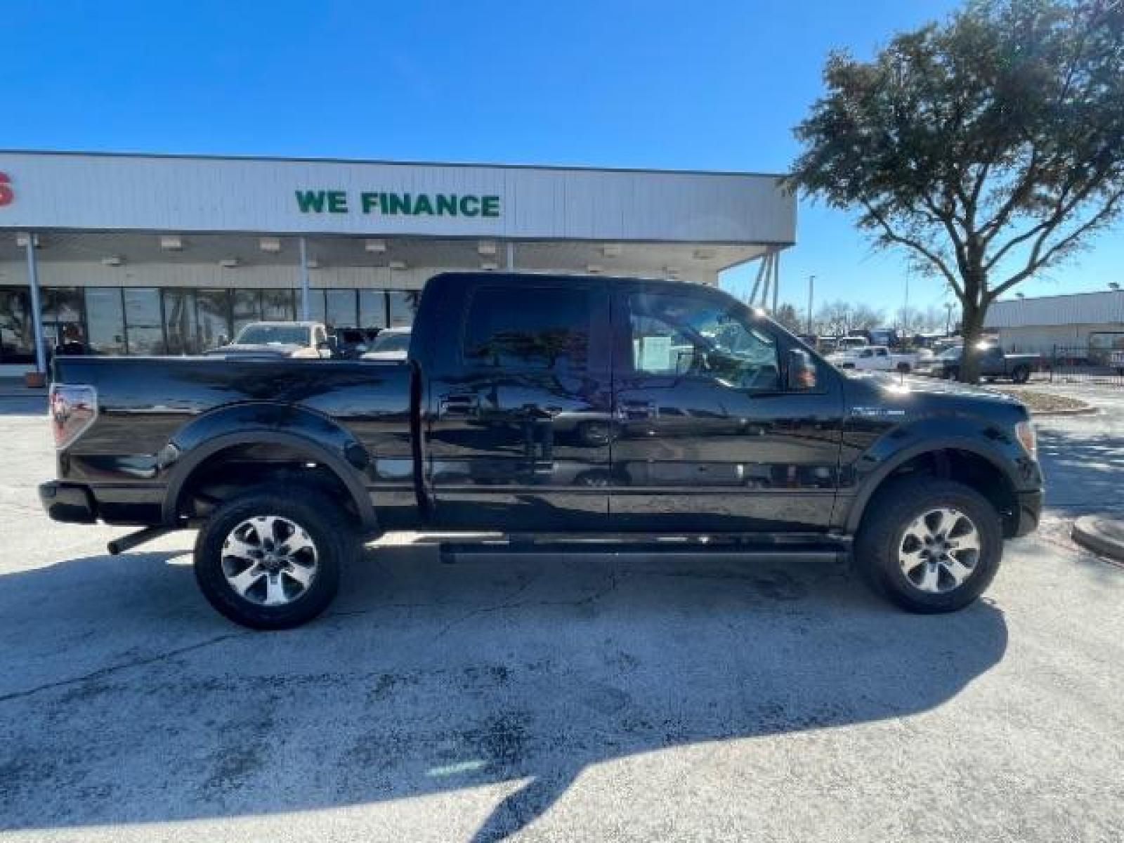 2013 BLACK Ford F-150 FX4 SuperCrew 5.5-ft (1FTFW1EF1DK) with an 5.0L V8 engine, 6-Speed Automatic transmission, located at 12182 Garland Rd, Dallas, TX, 75218, (214) 521-2040, 0.000000, 0.000000 - Photo #7