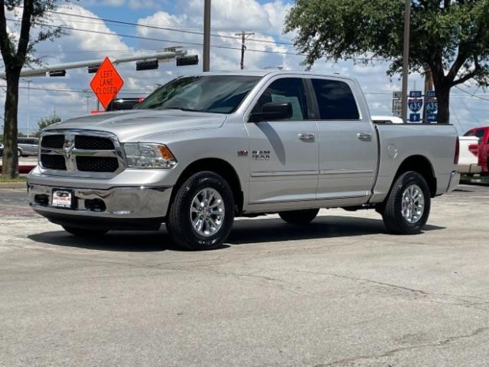 2013 Bright Silver Metallic RAM 1500 SLT Crew Cab SWB 4WD (1C6RR7LT3DS) with an 5.7L V8 OHV 16V engine, 6-Speed Automatic transmission, located at 12182 Garland Rd, Dallas, TX, 75218, (214) 521-2040, 0.000000, 0.000000 - Photo #1
