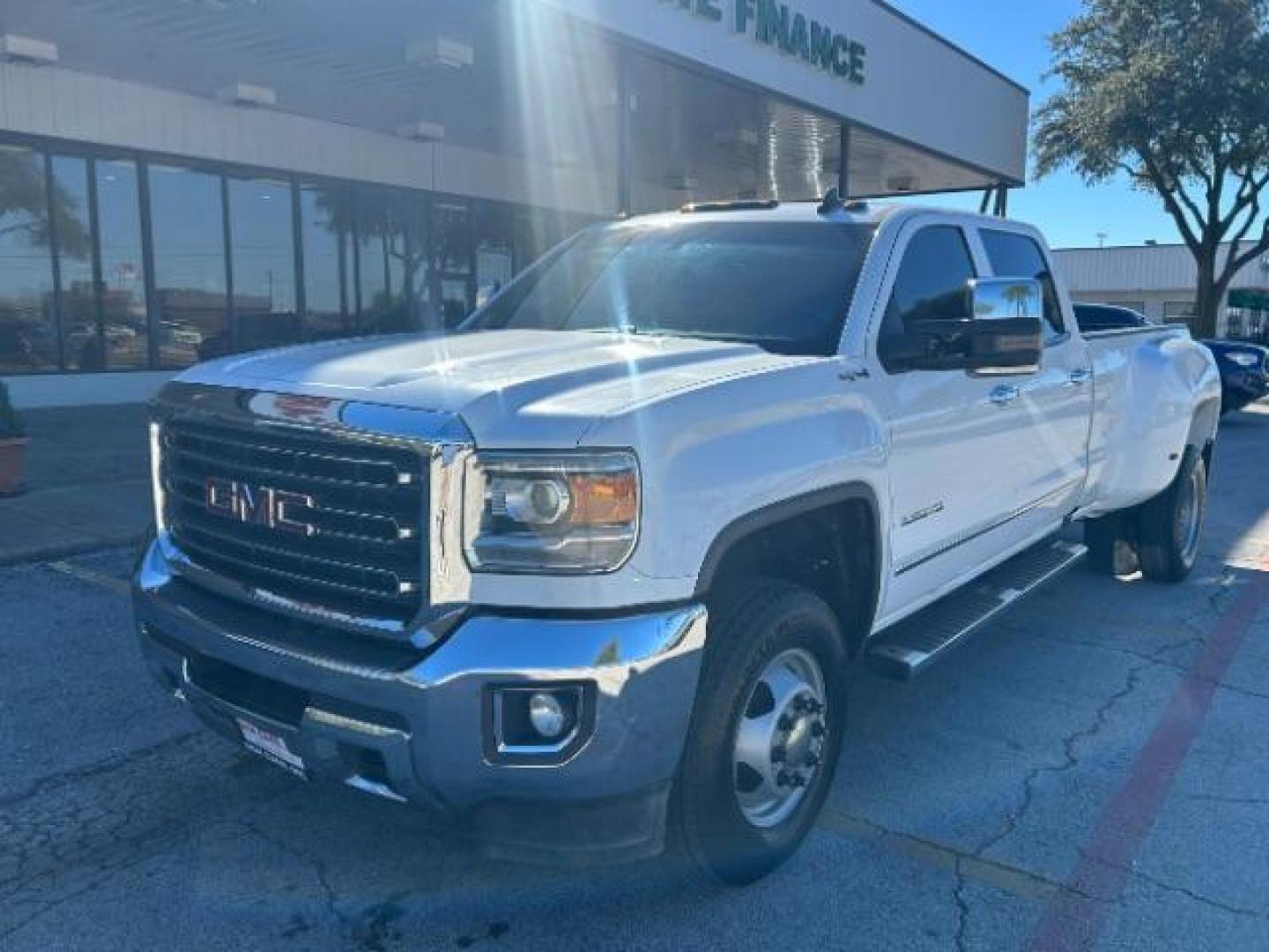 2018 Summit White GMC Sierra 3500HD SLT Crew Cab 4WD (1GT42XCG9JF) with an 6.0L V8 OHV 16V FFV engine, 6-Speed Automatic transmission, located at 12182 Garland Rd, Dallas, TX, 75218, (214) 521-2040, 0.000000, 0.000000 - Photo#2