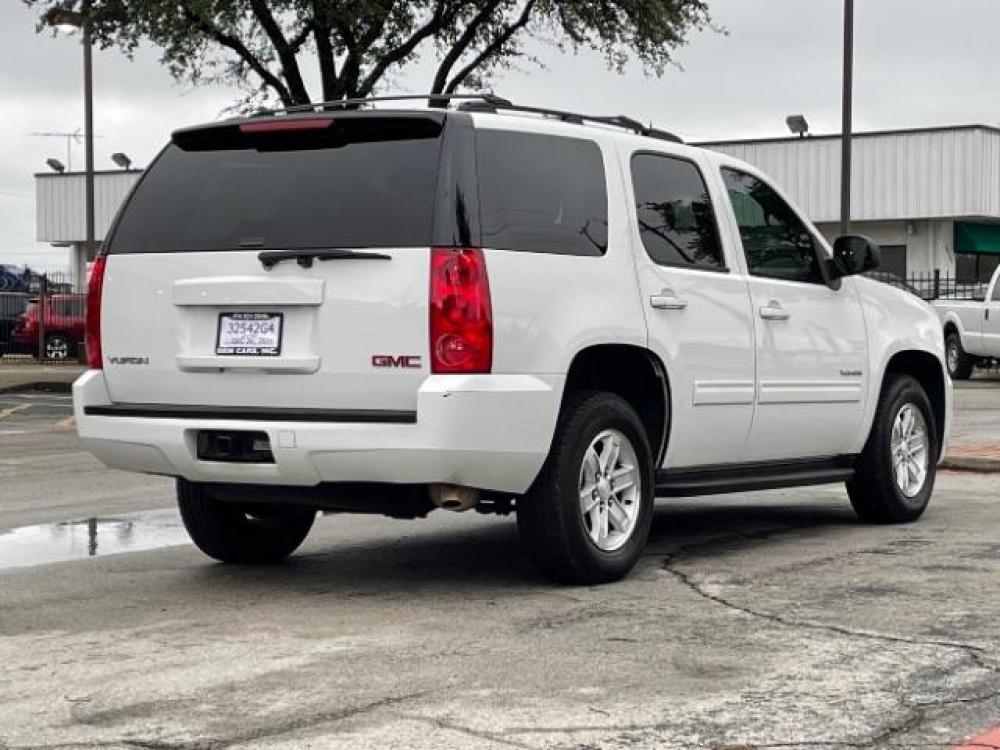 2013 Summit White GMC Yukon SLE 2WD (1GKS1AE07DR) with an 5.3L V8 OHV 16V FFV engine, 6-Speed Automatic transmission, located at 12182 Garland Rd, Dallas, TX, 75218, (214) 521-2040, 0.000000, 0.000000 - Photo #6