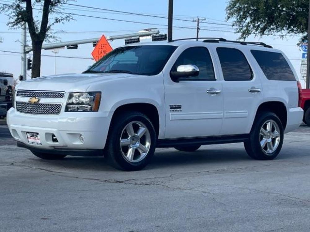 2013 Summit White Chevrolet Tahoe LS 2WD (1GNSCAE09DR) with an 5.3L V8 OHV 16V FFV engine, 6-Speed Automatic transmission, located at 12182 Garland Rd, Dallas, TX, 75218, (214) 521-2040, 0.000000, 0.000000 - Photo #2