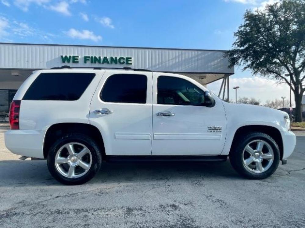 2013 Summit White Chevrolet Tahoe LS 2WD (1GNSCAE09DR) with an 5.3L V8 OHV 16V FFV engine, 6-Speed Automatic transmission, located at 12182 Garland Rd, Dallas, TX, 75218, (214) 521-2040, 0.000000, 0.000000 - Photo #7