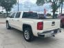 2014 Summit White GMC Sierra 1500 SLT Crew Cab 4WD (3GTU2VEC7EG) with an 5.3L V8 OHV 16V engine, 6-Speed Automatic transmission, located at 12182 Garland Rd, Dallas, TX, 75218, (214) 521-2040, 0.000000, 0.000000 - Photo#4
