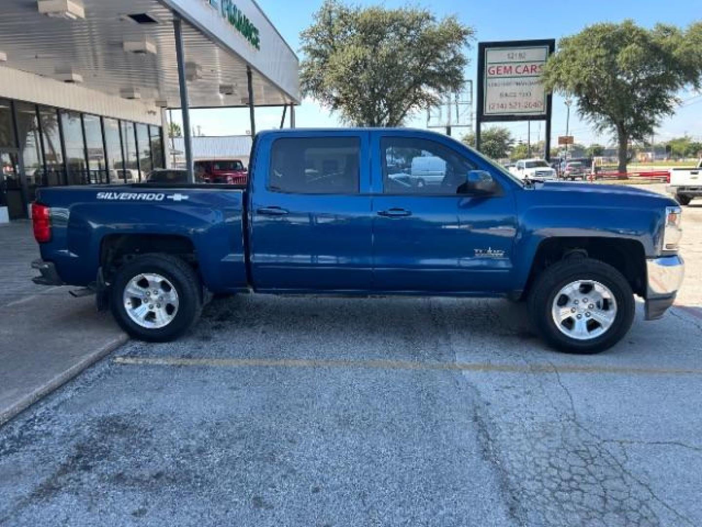 2016 Deep Ocean Blue Meta Chevrolet Silverado 1500 LT Crew Cab 2WD (3GCPCREC8GG) with an 5.3L V8 OHV 16V engine, 6-Speed Automatic transmission, located at 12182 Garland Rd, Dallas, TX, 75218, (214) 521-2040, 0.000000, 0.000000 - Photo#7
