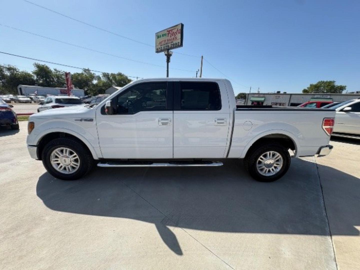 2012 Oxford White Ford F-150 Lariat SuperCrew 5.5 (1FTFW1CF4CF) with an 5.0L V8 engine, 6-Speed Automatic transmission, located at 12182 Garland Rd, Dallas, TX, 75218, (214) 521-2040, 0.000000, 0.000000- Photo#1