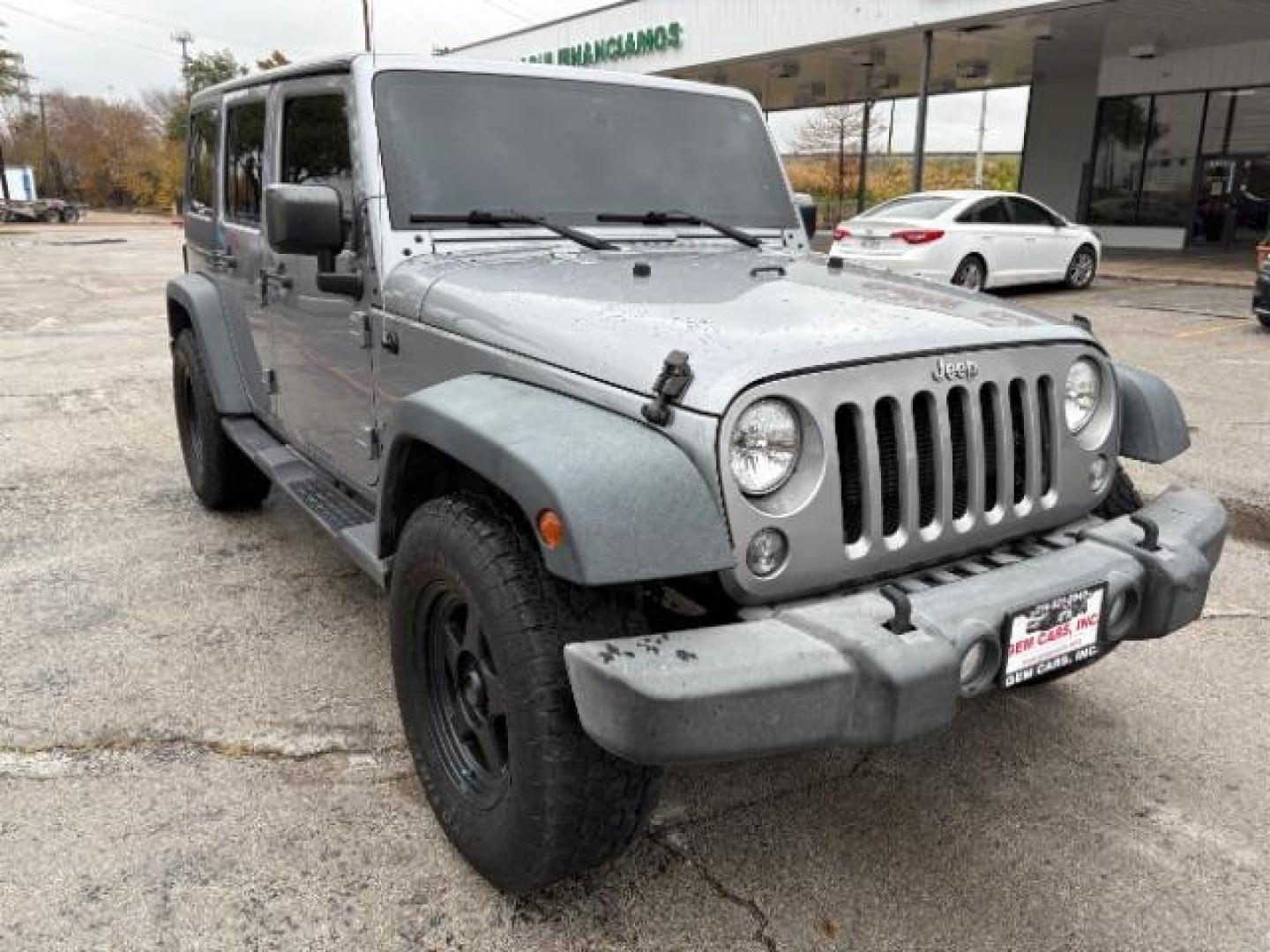 2015 Billet Silver Metall /Black, cloth Jeep Wrangler Unlimited Sport 4WD (1C4BJWDG7FL) with an 3.6L V6 DOHC 24V FFV engine, 5-Speed Automatic transmission, located at 12182 Garland Rd, Dallas, TX, 75218, (214) 521-2040, 0.000000, 0.000000 - Photo#0