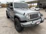 2015 Billet Silver Metall /Black, cloth Jeep Wrangler Unlimited Sport 4WD (1C4BJWDG7FL) with an 3.6L V6 DOHC 24V FFV engine, 5-Speed Automatic transmission, located at 12182 Garland Rd, Dallas, TX, 75218, (214) 521-2040, 0.000000, 0.000000 - Photo#0