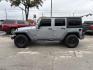 2015 Billet Silver Metall /Black, cloth Jeep Wrangler Unlimited Sport 4WD (1C4BJWDG7FL) with an 3.6L V6 DOHC 24V FFV engine, 5-Speed Automatic transmission, located at 12182 Garland Rd, Dallas, TX, 75218, (214) 521-2040, 0.000000, 0.000000 - Photo#1