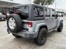 2015 Billet Silver Metall /Black, cloth Jeep Wrangler Unlimited Sport 4WD (1C4BJWDG7FL) with an 3.6L V6 DOHC 24V FFV engine, 5-Speed Automatic transmission, located at 12182 Garland Rd, Dallas, TX, 75218, (214) 521-2040, 0.000000, 0.000000 - Photo#4