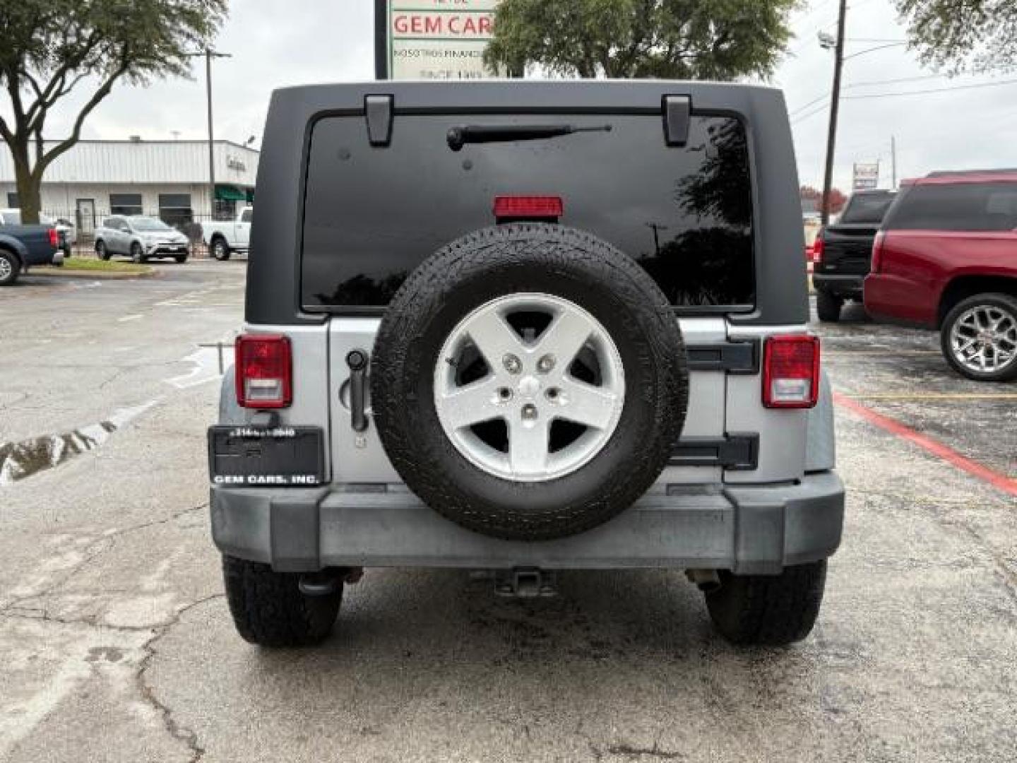 2015 Billet Silver Metall /Black, cloth Jeep Wrangler Unlimited Sport 4WD (1C4BJWDG7FL) with an 3.6L V6 DOHC 24V FFV engine, 5-Speed Automatic transmission, located at 12182 Garland Rd, Dallas, TX, 75218, (214) 521-2040, 0.000000, 0.000000 - Photo#5