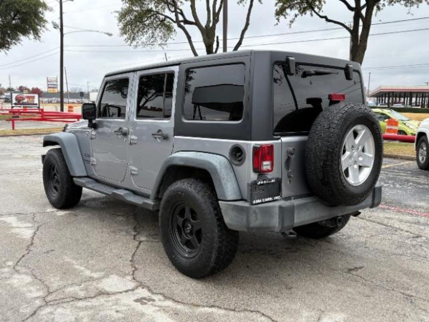 2015 Billet Silver Metall /Black, cloth Jeep Wrangler Unlimited Sport 4WD (1C4BJWDG7FL) with an 3.6L V6 DOHC 24V FFV engine, 5-Speed Automatic transmission, located at 12182 Garland Rd, Dallas, TX, 75218, (214) 521-2040, 0.000000, 0.000000 - Photo#6