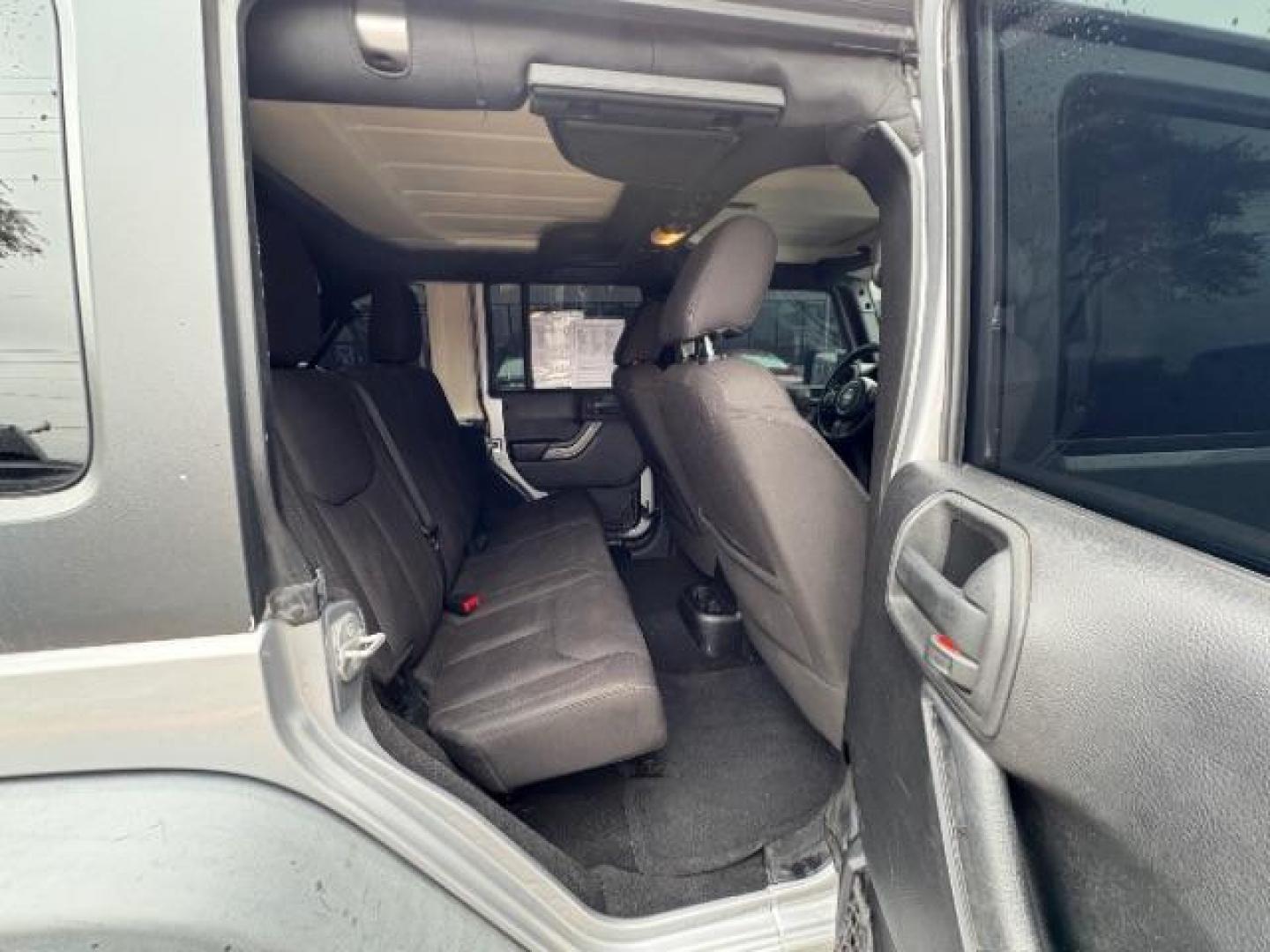 2015 Billet Silver Metall /Black, cloth Jeep Wrangler Unlimited Sport 4WD (1C4BJWDG7FL) with an 3.6L V6 DOHC 24V FFV engine, 5-Speed Automatic transmission, located at 12182 Garland Rd, Dallas, TX, 75218, (214) 521-2040, 0.000000, 0.000000 - Photo#7