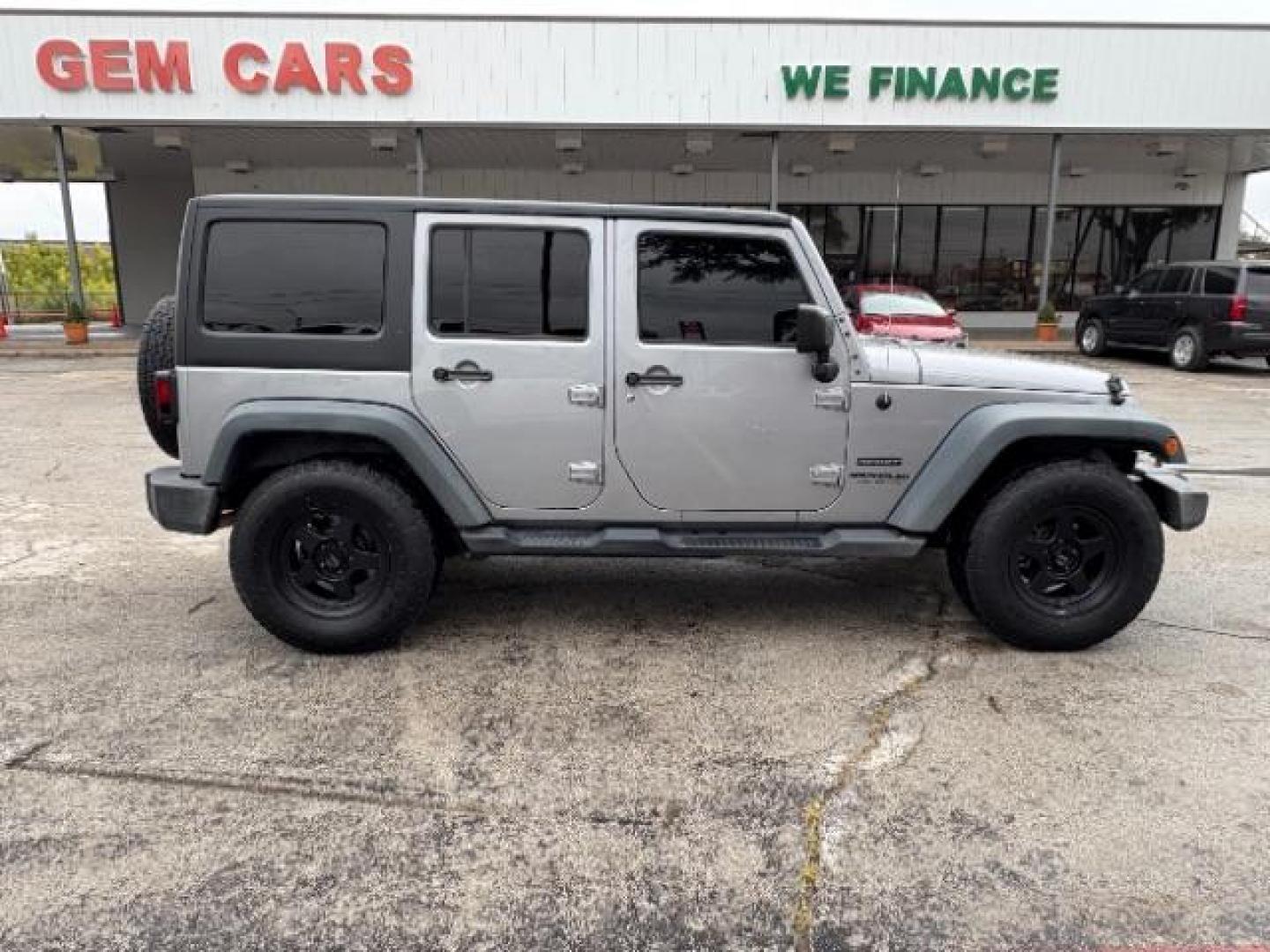 2015 Billet Silver Metall /Black, cloth Jeep Wrangler Unlimited Sport 4WD (1C4BJWDG7FL) with an 3.6L V6 DOHC 24V FFV engine, 5-Speed Automatic transmission, located at 12182 Garland Rd, Dallas, TX, 75218, (214) 521-2040, 0.000000, 0.000000 - Photo#9