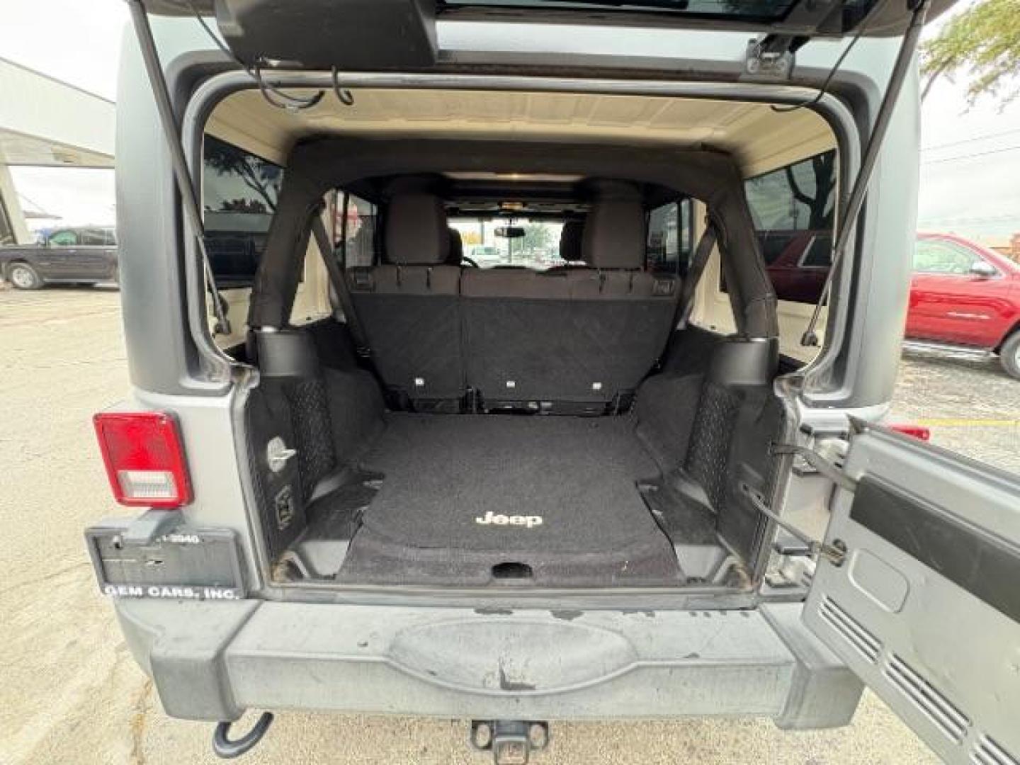 2015 Billet Silver Metall /Black, cloth Jeep Wrangler Unlimited Sport 4WD (1C4BJWDG7FL) with an 3.6L V6 DOHC 24V FFV engine, 5-Speed Automatic transmission, located at 12182 Garland Rd, Dallas, TX, 75218, (214) 521-2040, 0.000000, 0.000000 - Photo#12