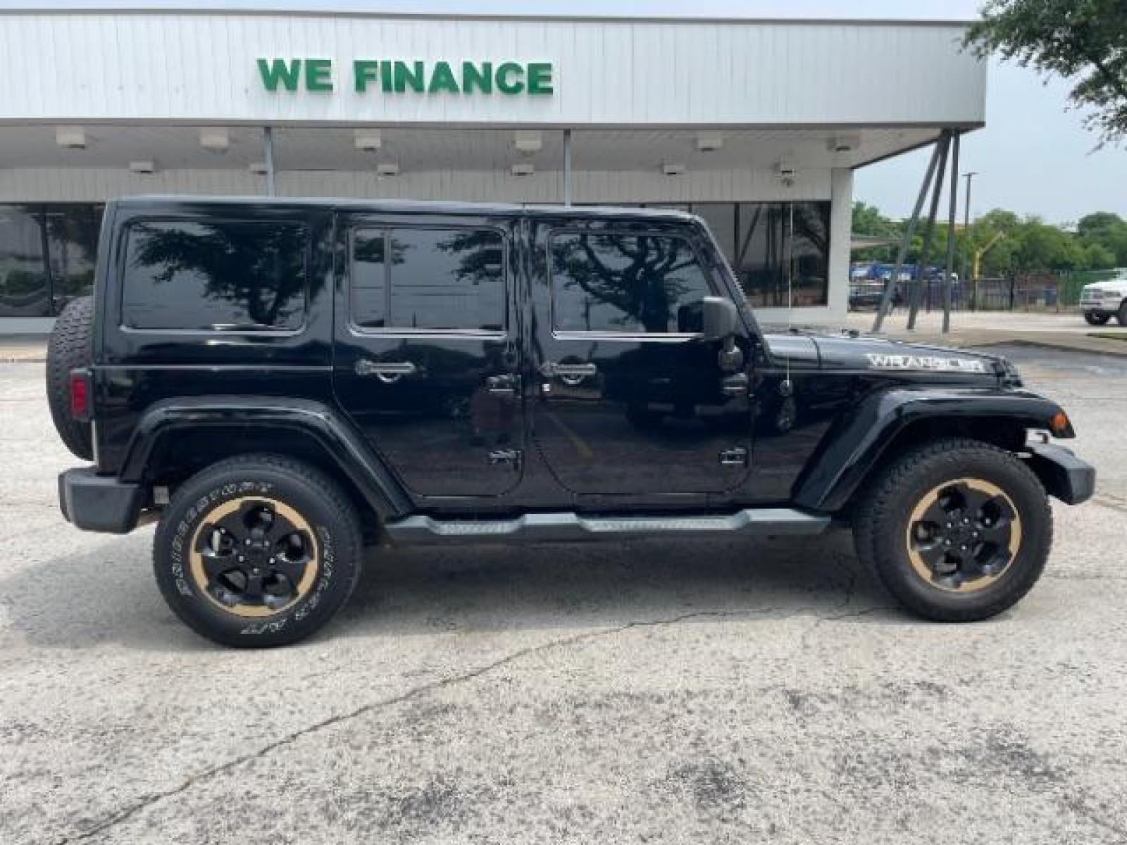 2014 Black Clearcoat Jeep Wrangler Unlimited Sahara 4WD (1C4BJWEG9EL) with an 3.6L V6 DOHC 24V FFV engine, located at 12182 Garland Rd, Dallas, TX, 75218, (214) 521-2040, 0.000000, 0.000000 - Photo #6