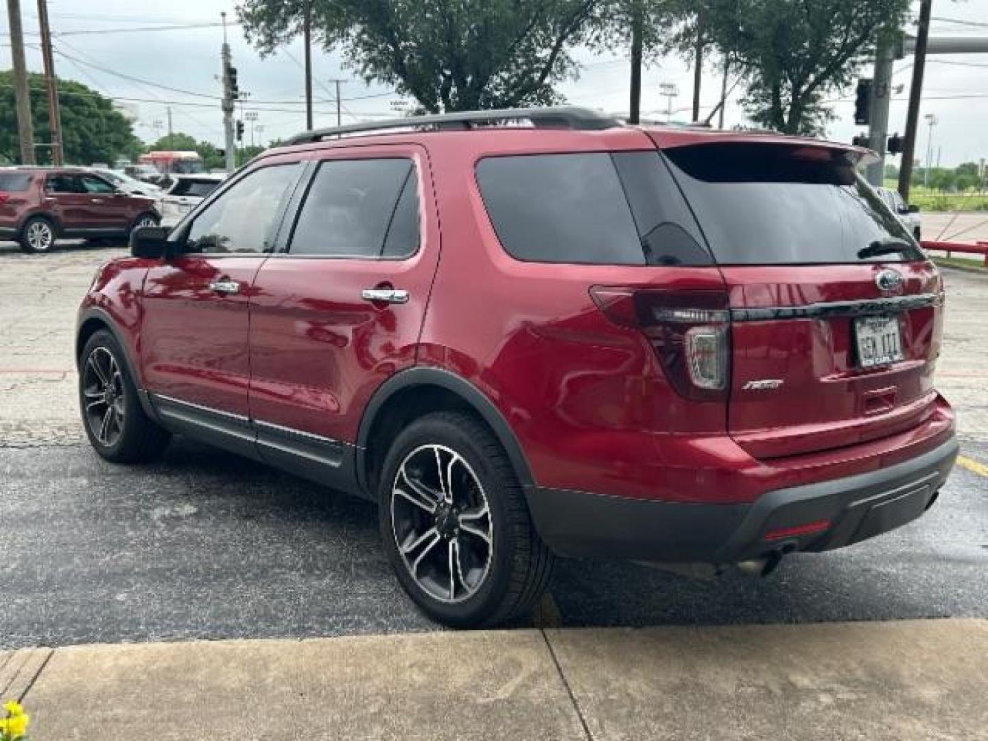 2014 Ruby Red Met Tinted Ford Explorer Sport 4WD (1FM5K8GT0EG) with an 3.5L V6 DOHC 24V engine, 6-Speed Automatic transmission, located at 12182 Garland Rd, Dallas, TX, 75218, (214) 521-2040, 0.000000, 0.000000 - Photo#4