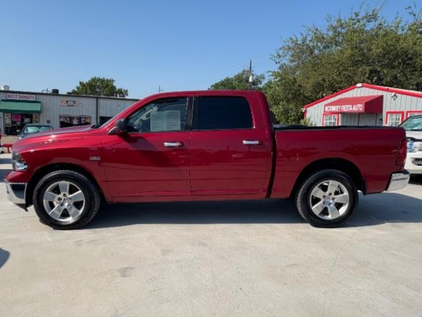 2012 Flame Red /Light Pebble Beige/Bark Brown Cloth Interior RAM 1500 SLT Crew Cab 4WD (1C6RD7LT6CS) with an 5.7L V8 OHV 16V engine, 6-Speed Automatic transmission, located at 12182 Garland Rd, Dallas, TX, 75218, (214) 521-2040, 0.000000, 0.000000 - Photo#1