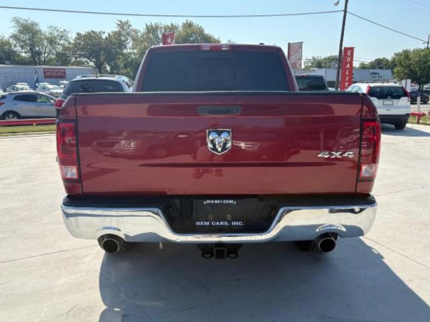 2012 Flame Red /Light Pebble Beige/Bark Brown Cloth Interior RAM 1500 SLT Crew Cab 4WD (1C6RD7LT6CS) with an 5.7L V8 OHV 16V engine, 6-Speed Automatic transmission, located at 12182 Garland Rd, Dallas, TX, 75218, (214) 521-2040, 0.000000, 0.000000 - Photo#4