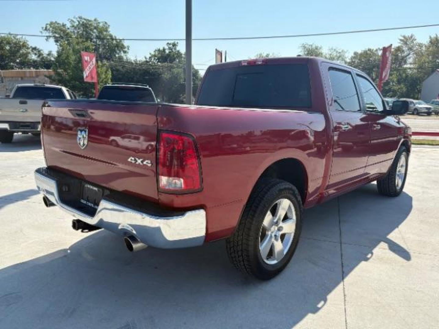 2012 Flame Red /Light Pebble Beige/Bark Brown Cloth Interior RAM 1500 SLT Crew Cab 4WD (1C6RD7LT6CS) with an 5.7L V8 OHV 16V engine, 6-Speed Automatic transmission, located at 12182 Garland Rd, Dallas, TX, 75218, (214) 521-2040, 0.000000, 0.000000 - Photo#8