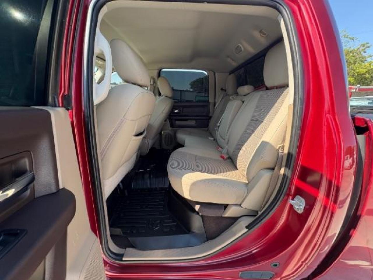 2012 Flame Red /Light Pebble Beige/Bark Brown Cloth Interior RAM 1500 SLT Crew Cab 4WD (1C6RD7LT6CS) with an 5.7L V8 OHV 16V engine, 6-Speed Automatic transmission, located at 12182 Garland Rd, Dallas, TX, 75218, (214) 521-2040, 0.000000, 0.000000 - Photo#9