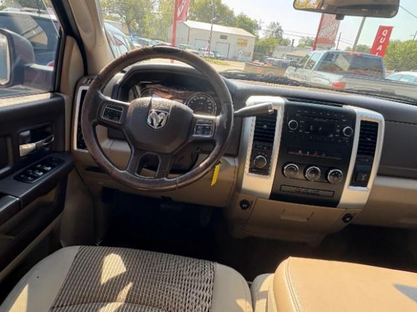 2012 Flame Red /Light Pebble Beige/Bark Brown Cloth Interior RAM 1500 SLT Crew Cab 4WD (1C6RD7LT6CS) with an 5.7L V8 OHV 16V engine, 6-Speed Automatic transmission, located at 12182 Garland Rd, Dallas, TX, 75218, (214) 521-2040, 0.000000, 0.000000 - Photo#14