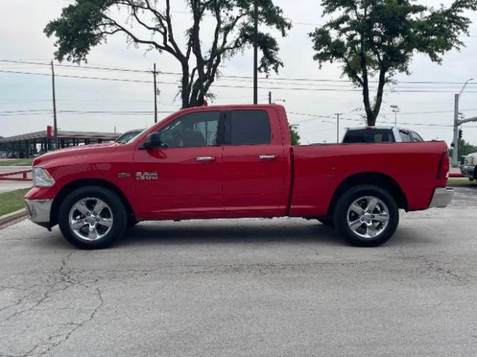 2016 Flame Red Clear Coat RAM 1500 SLT Quad Cab 2WD (1C6RR6GT1GS) with an 5.7L V8 OHV 16V engine, 8-Speed Automatic transmission, located at 12182 Garland Rd, Dallas, TX, 75218, (214) 521-2040, 0.000000, 0.000000 - Photo #6