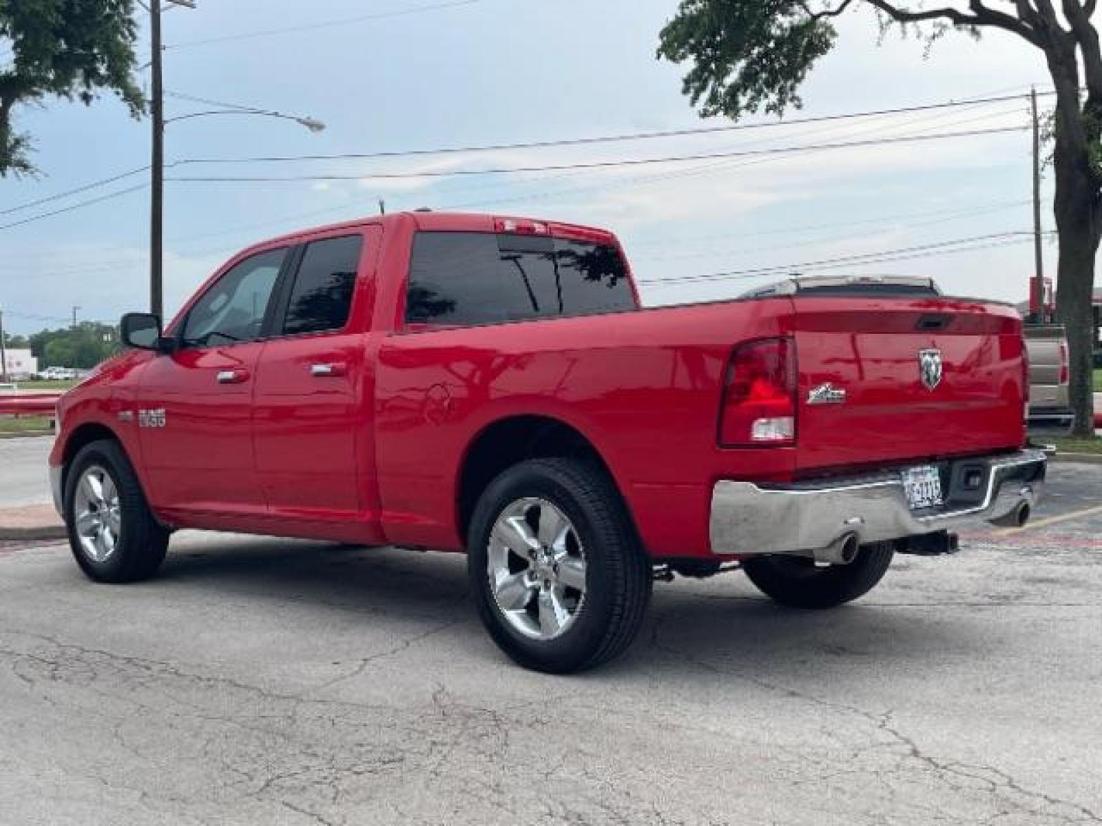 2016 Flame Red Clear Coat RAM 1500 SLT Quad Cab 2WD (1C6RR6GT1GS) with an 5.7L V8 OHV 16V engine, 8-Speed Automatic transmission, located at 12182 Garland Rd, Dallas, TX, 75218, (214) 521-2040, 0.000000, 0.000000 - Photo #2