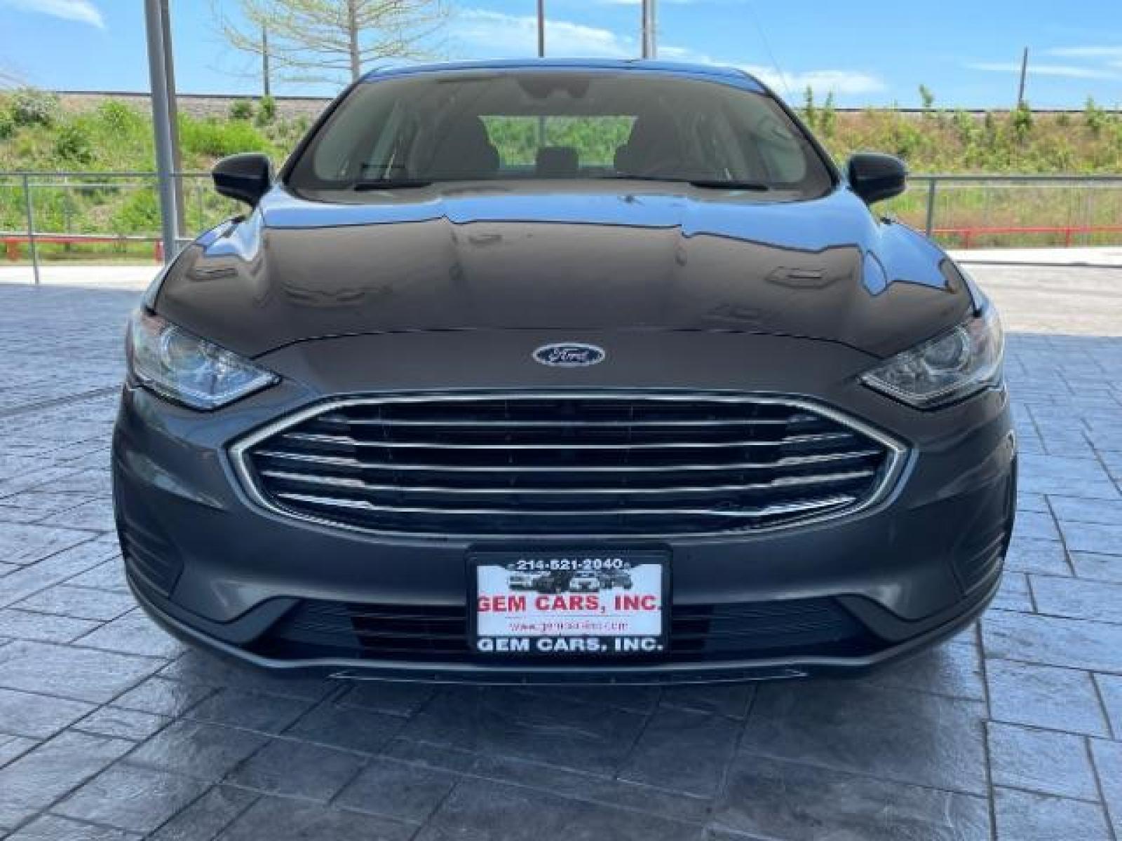 2019 Magnetic Metallic /Ebony, cloth Ford Fusion SE (3FA6P0HD5KR) with an 1.5L L4 DOHC 16V engine, 6-Speed Automatic transmission, located at 12182 Garland Rd, Dallas, TX, 75218, (214) 521-2040, 0.000000, 0.000000 - Photo #4