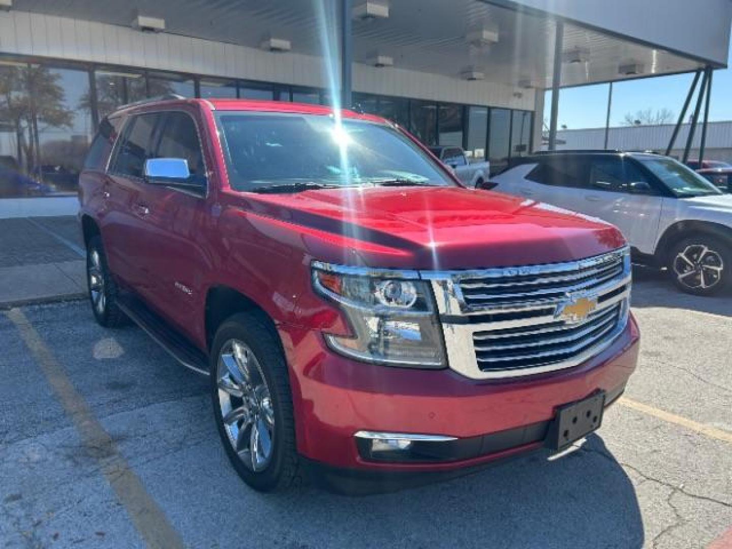 2015 Red Chevrolet Tahoe LTZ 2WD (1GNSCCKC7FR) with an 5.3L V8 OHV 16V engine, 6-Speed Automatic transmission, located at 12182 Garland Rd, Dallas, TX, 75218, (214) 521-2040, 0.000000, 0.000000 - Photo#0