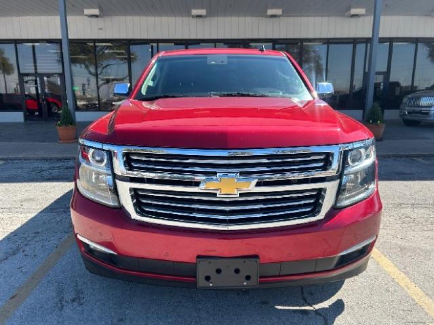 2015 Red Chevrolet Tahoe LTZ 2WD (1GNSCCKC7FR) with an 5.3L V8 OHV 16V engine, 6-Speed Automatic transmission, located at 12182 Garland Rd, Dallas, TX, 75218, (214) 521-2040, 0.000000, 0.000000 - Photo#1