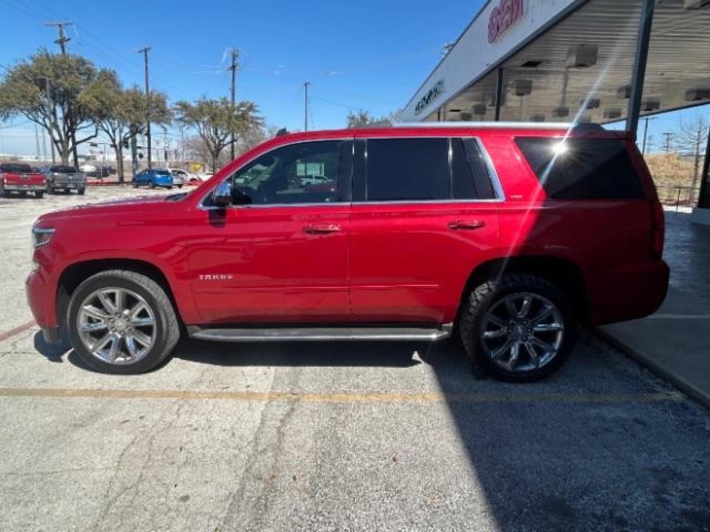 2015 Red Chevrolet Tahoe LTZ 2WD (1GNSCCKC7FR) with an 5.3L V8 OHV 16V engine, 6-Speed Automatic transmission, located at 12182 Garland Rd, Dallas, TX, 75218, (214) 521-2040, 0.000000, 0.000000 - Photo#3