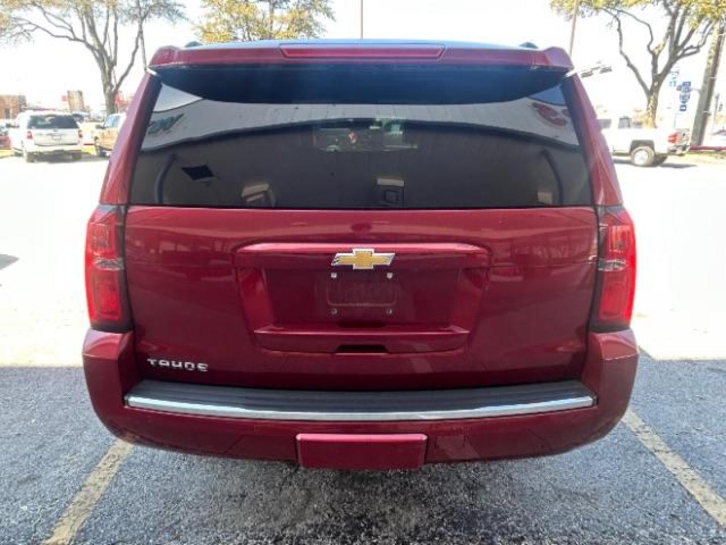 2015 Red Chevrolet Tahoe LTZ 2WD (1GNSCCKC7FR) with an 5.3L V8 OHV 16V engine, 6-Speed Automatic transmission, located at 12182 Garland Rd, Dallas, TX, 75218, (214) 521-2040, 0.000000, 0.000000 - Photo#5