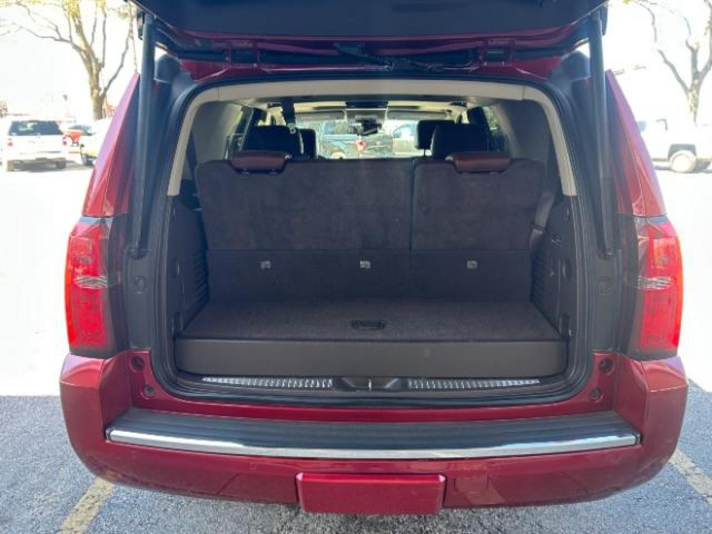 2015 Red Chevrolet Tahoe LTZ 2WD (1GNSCCKC7FR) with an 5.3L V8 OHV 16V engine, 6-Speed Automatic transmission, located at 12182 Garland Rd, Dallas, TX, 75218, (214) 521-2040, 0.000000, 0.000000 - Photo#6