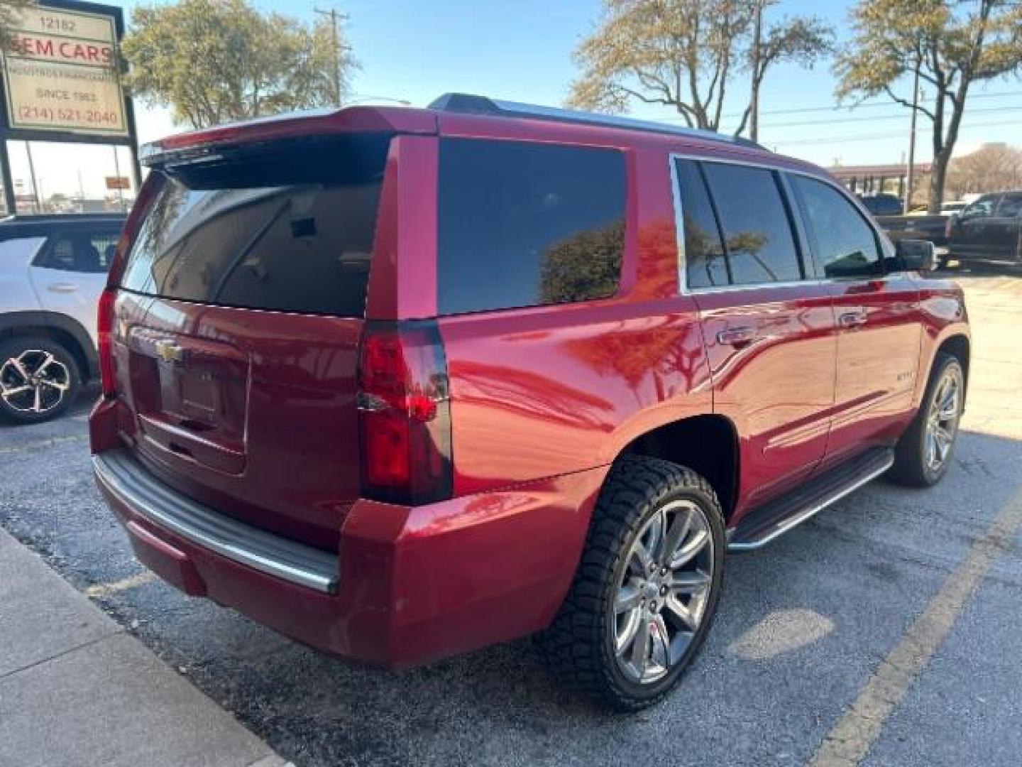 2015 Red Chevrolet Tahoe LTZ 2WD (1GNSCCKC7FR) with an 5.3L V8 OHV 16V engine, 6-Speed Automatic transmission, located at 12182 Garland Rd, Dallas, TX, 75218, (214) 521-2040, 0.000000, 0.000000 - Photo#7