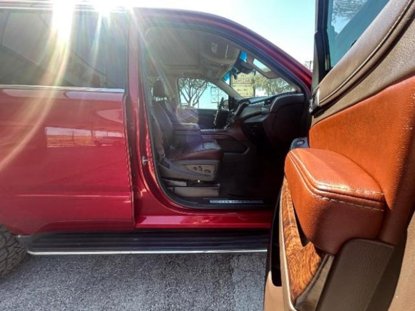 2015 Red Chevrolet Tahoe LTZ 2WD (1GNSCCKC7FR) with an 5.3L V8 OHV 16V engine, 6-Speed Automatic transmission, located at 12182 Garland Rd, Dallas, TX, 75218, (214) 521-2040, 0.000000, 0.000000 - Photo#11