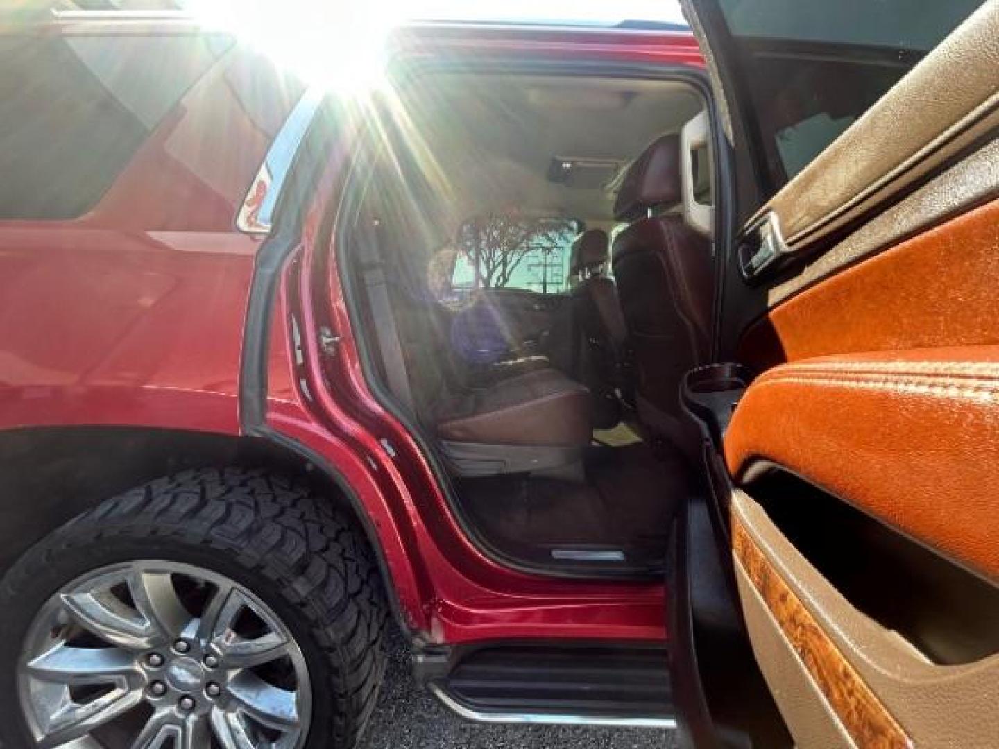 2015 Red Chevrolet Tahoe LTZ 2WD (1GNSCCKC7FR) with an 5.3L V8 OHV 16V engine, 6-Speed Automatic transmission, located at 12182 Garland Rd, Dallas, TX, 75218, (214) 521-2040, 0.000000, 0.000000 - Photo#12