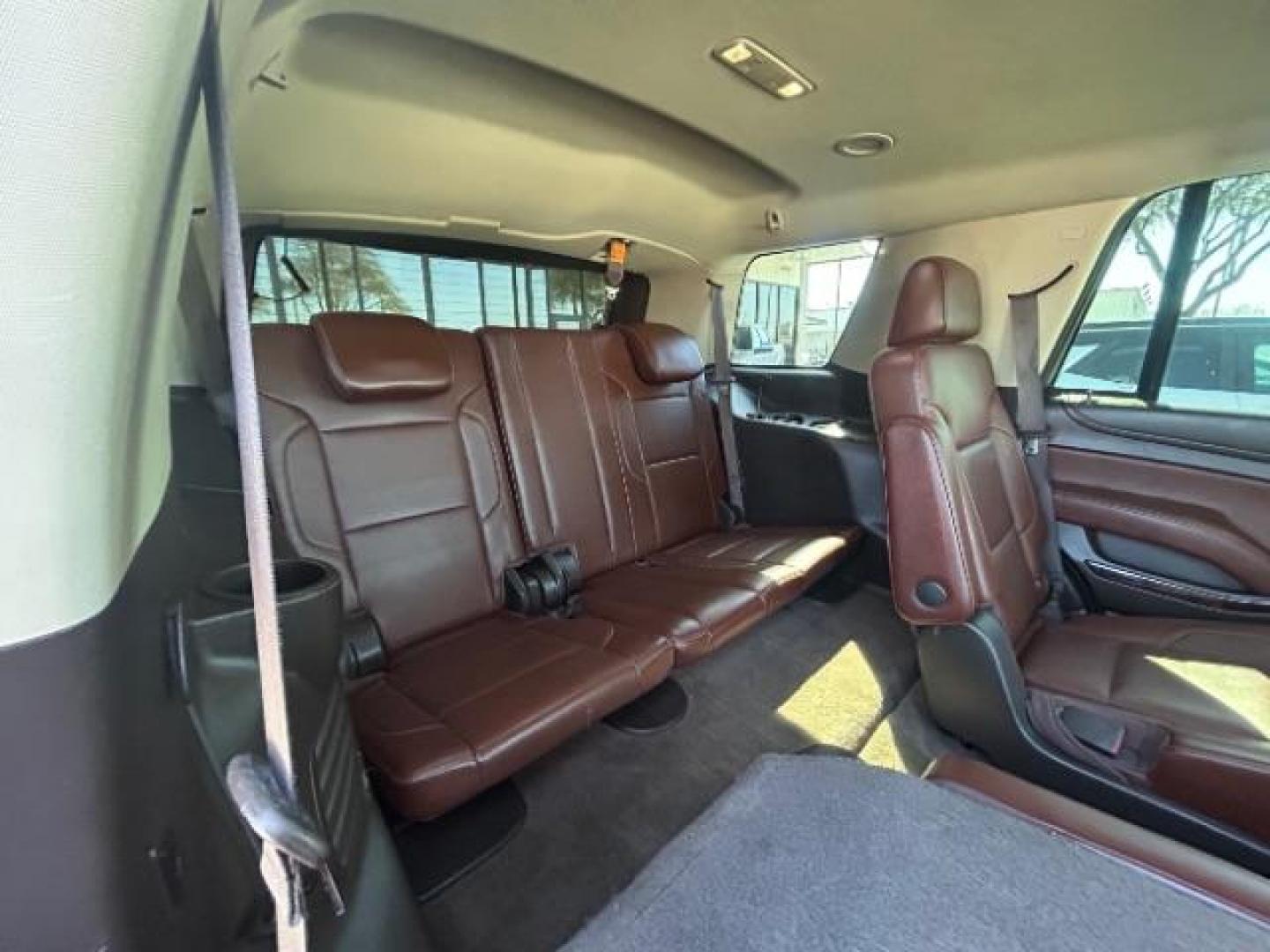 2015 Red Chevrolet Tahoe LTZ 2WD (1GNSCCKC7FR) with an 5.3L V8 OHV 16V engine, 6-Speed Automatic transmission, located at 12182 Garland Rd, Dallas, TX, 75218, (214) 521-2040, 0.000000, 0.000000 - Photo#13