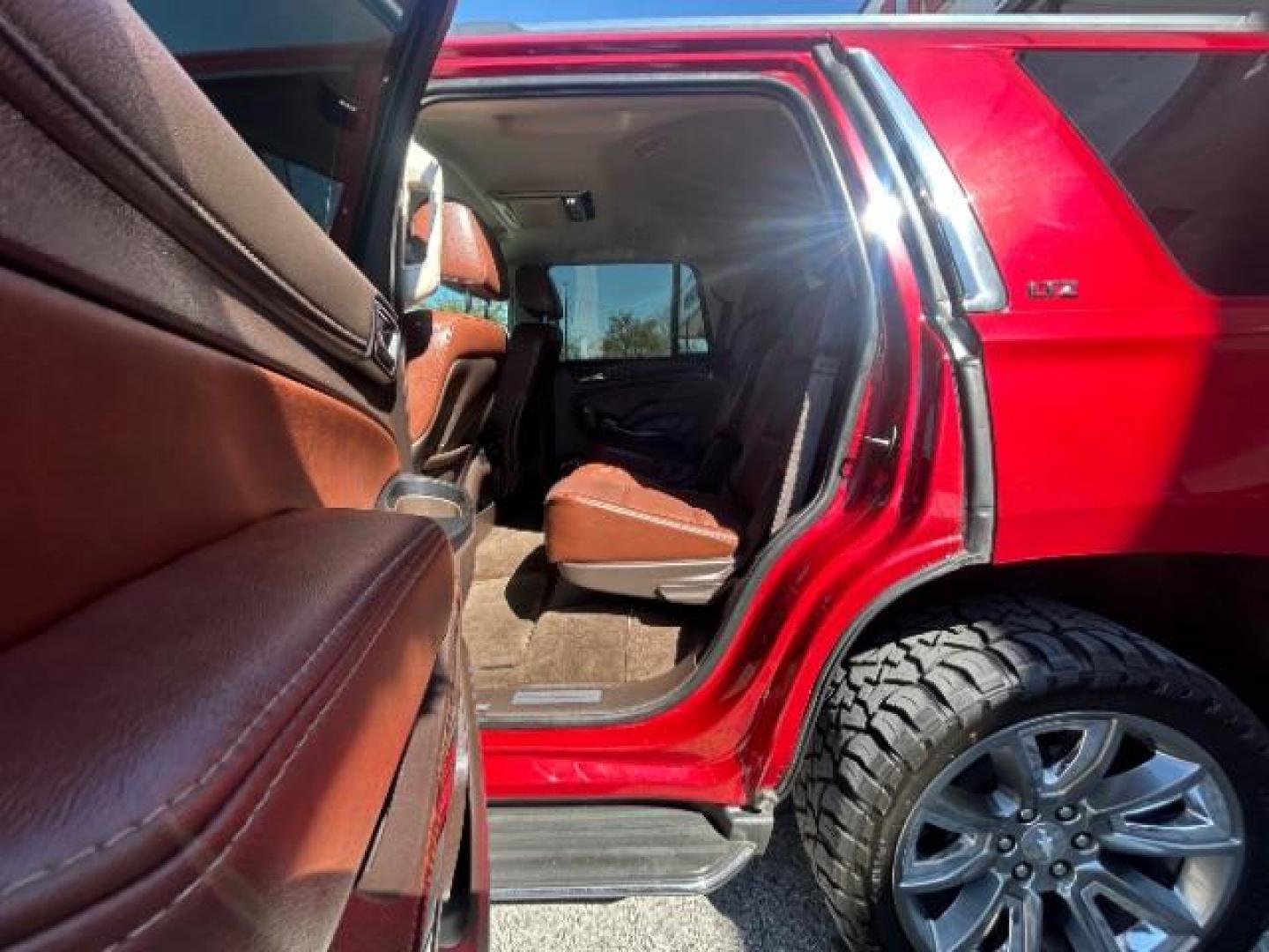 2015 Red Chevrolet Tahoe LTZ 2WD (1GNSCCKC7FR) with an 5.3L V8 OHV 16V engine, 6-Speed Automatic transmission, located at 12182 Garland Rd, Dallas, TX, 75218, (214) 521-2040, 0.000000, 0.000000 - Photo#14